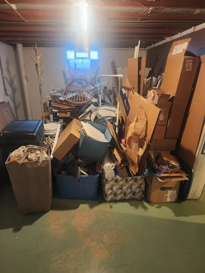 Roll-off dumpster container at job site for 4 Yard Dumpster Rental in Baxley